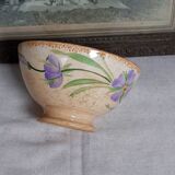 Old bowl in earthenware with floral decoration.