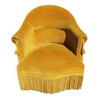 Fauteuil crapaud en velours ocre