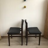Pair of Danish chairs from the 60s in teak and black leatherette.