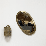 Oval brass mirror