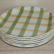 6 green and yellow checkered plates, tea towel