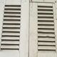 Old shutter in folding wooden louver