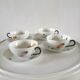 4 cups and cups in fine Limoges porcelain signed LC 60s