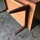 Vintage Scandinavian secretary in rosewood with drawers featuring fin-style handles.
