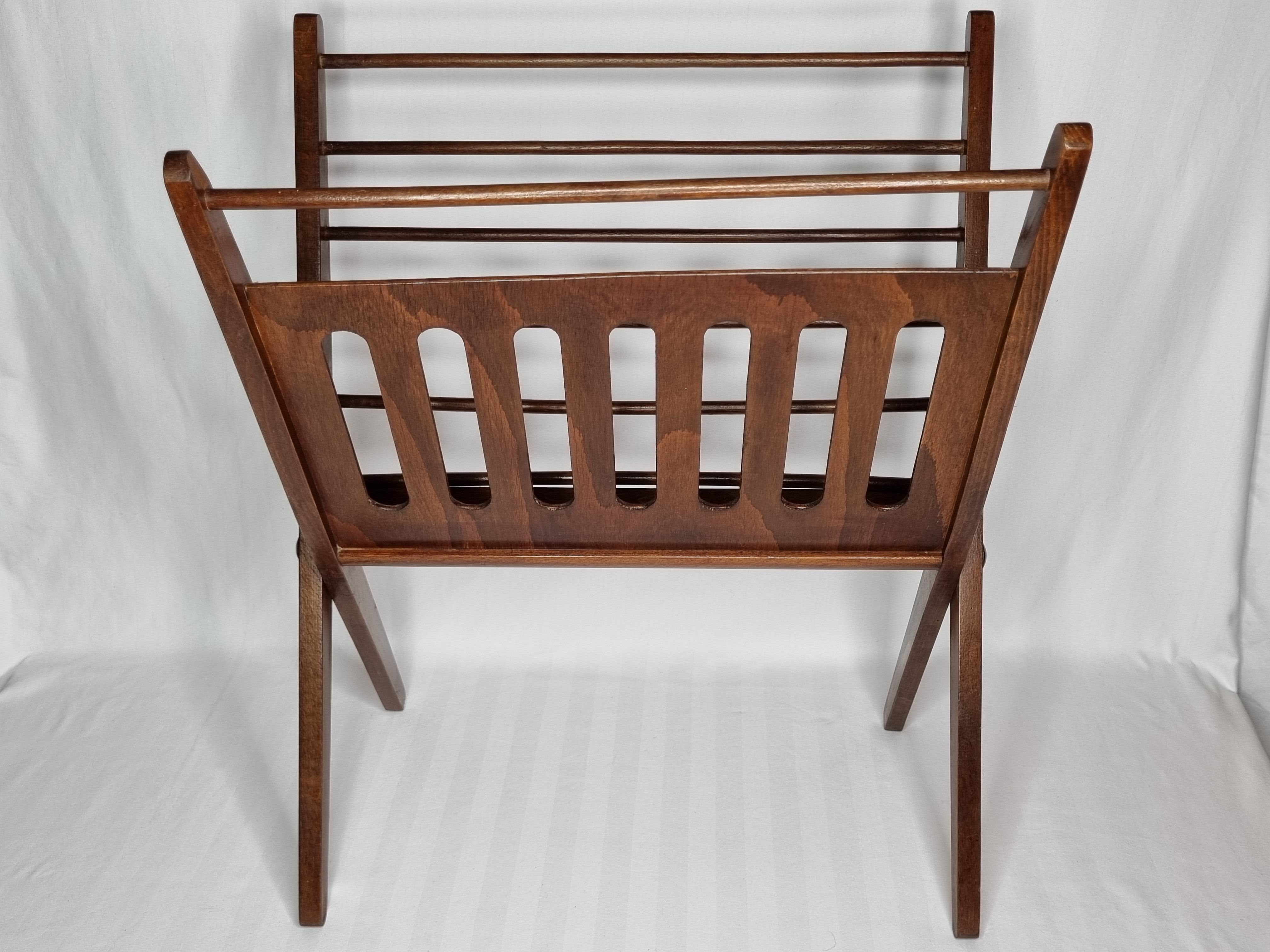 Folding teak magazine door by Cees Braakman