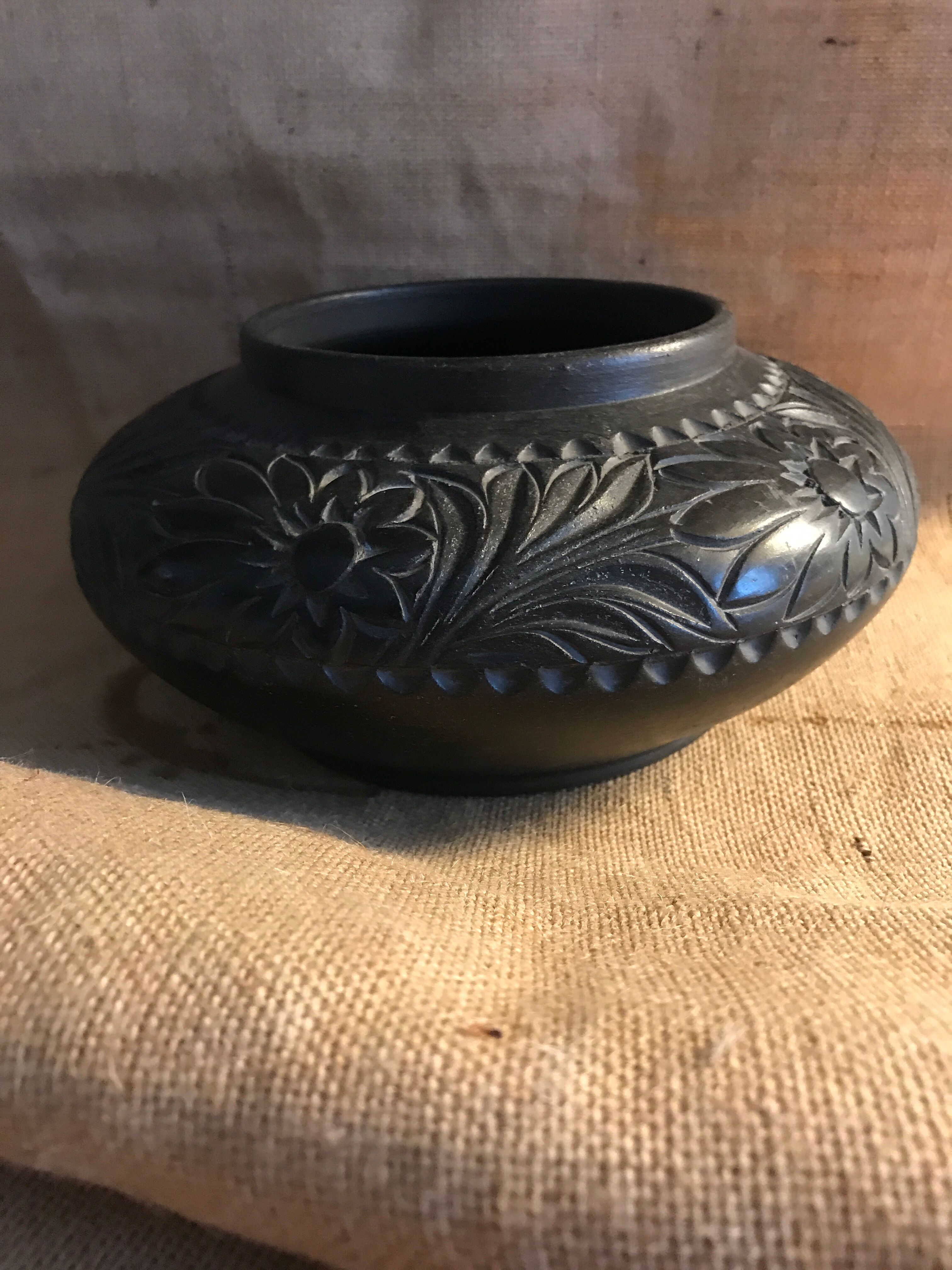 Engraved terracotta vase