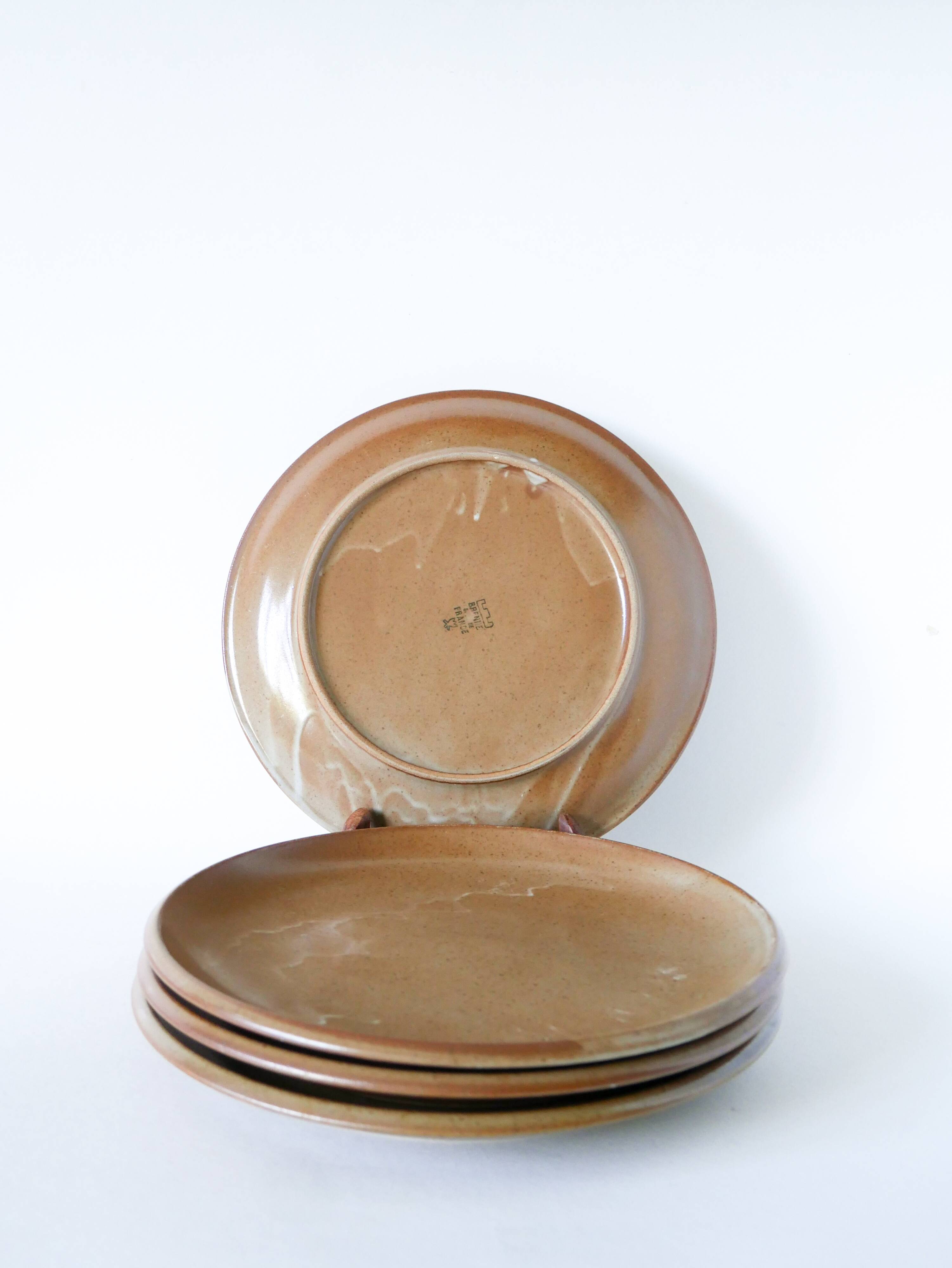 Set of 4 large flat plates in stoneware, Brenne stoneware, 1970.