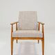 Fauteuil scandinave en tissu tressé beige