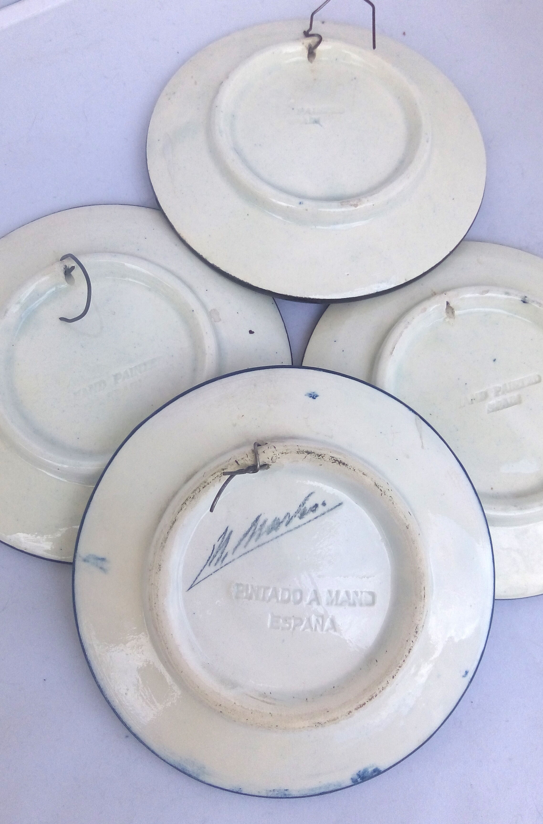 Lot of 4 hand-painted Spanish plates