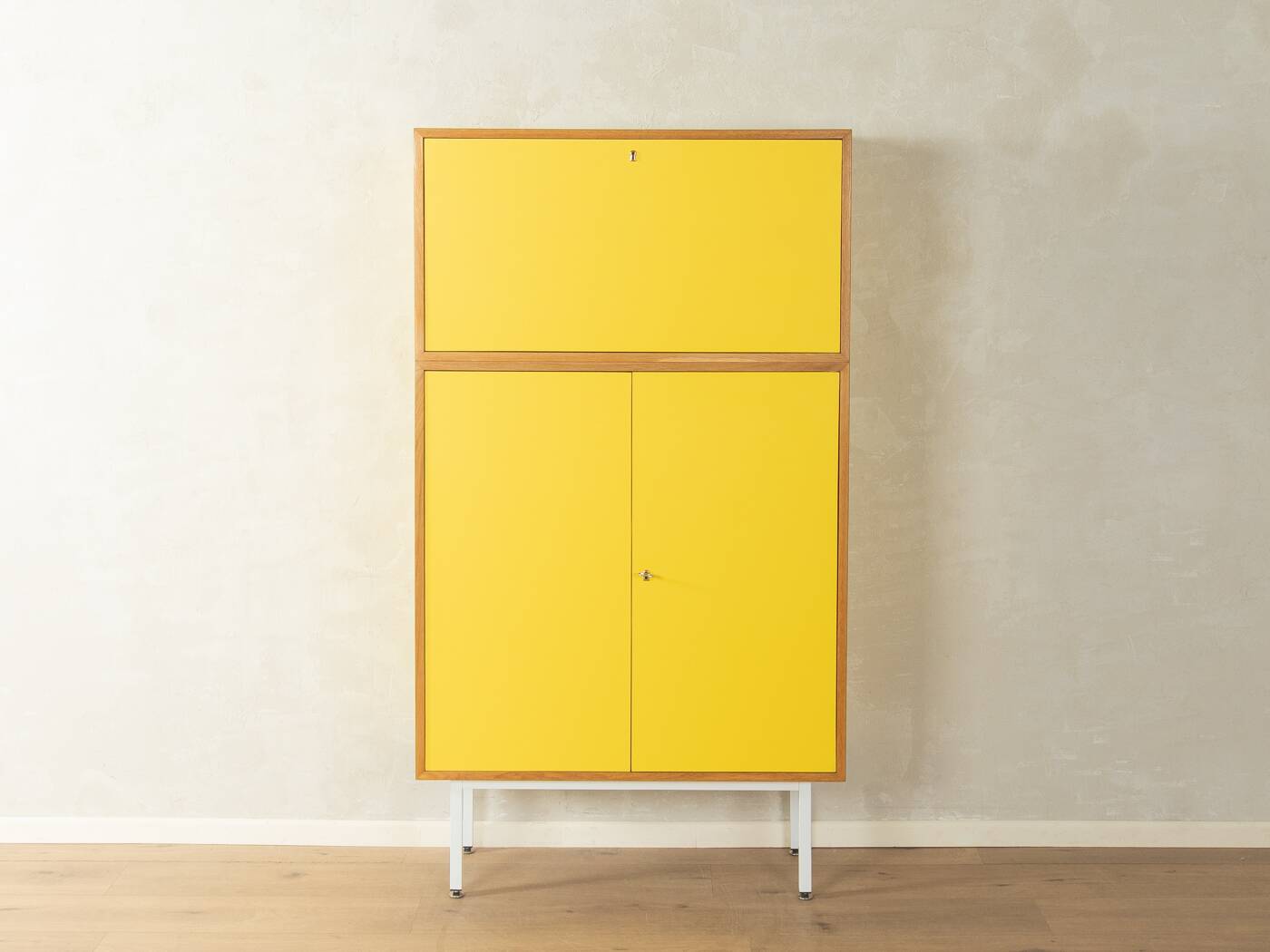 Classic sideboard from the 1960s, oak veneer, yellow Resopal, white steel feet