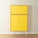 Classic sideboard from the 1960s, oak veneer, yellow Resopal, white steel feet