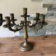 Pair of large 5-light candlesticks in patinated brass, classical style.