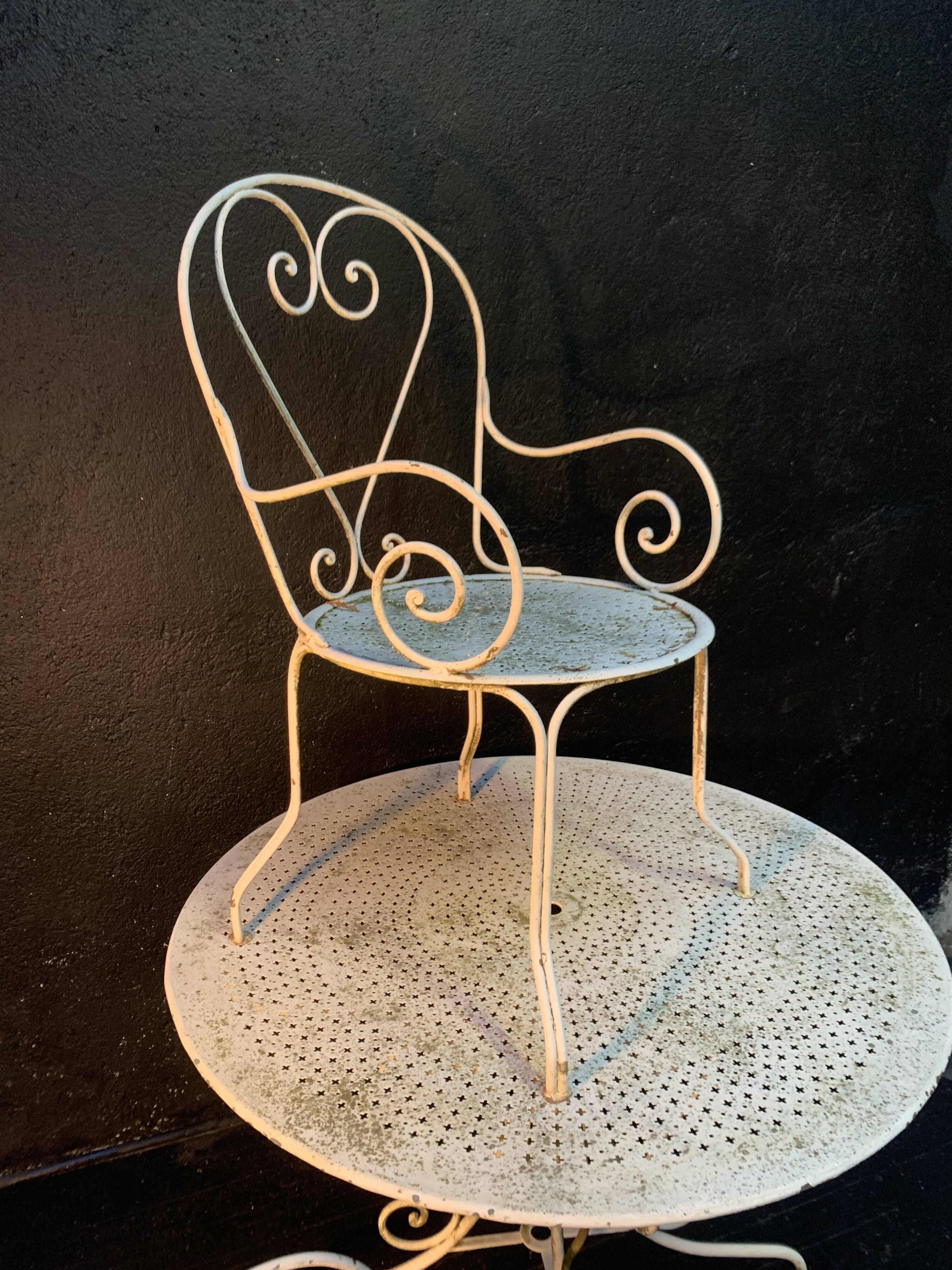 Set of wrought iron garden furniture