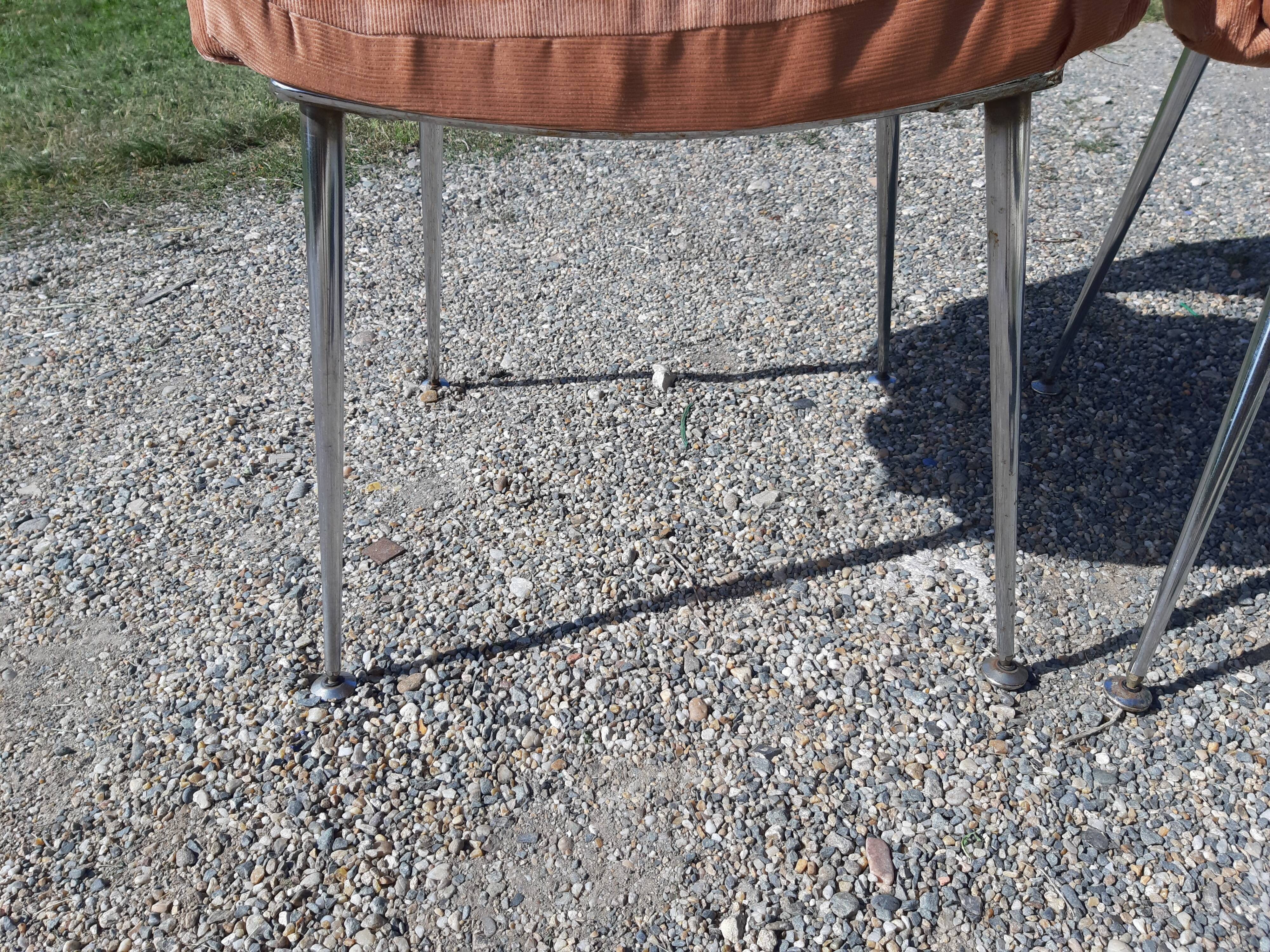 Pair of vintage armchairs of the 70s chrome and salmon fabrics
