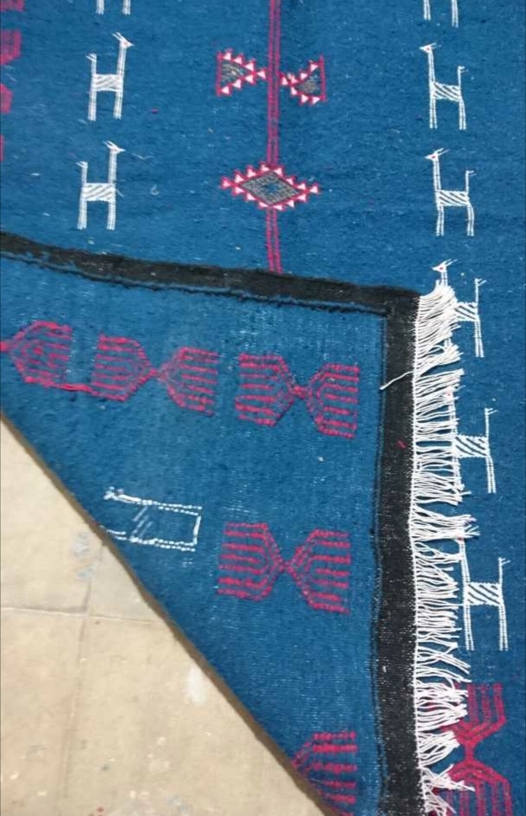 Tapis bleu en laine 195x110cm