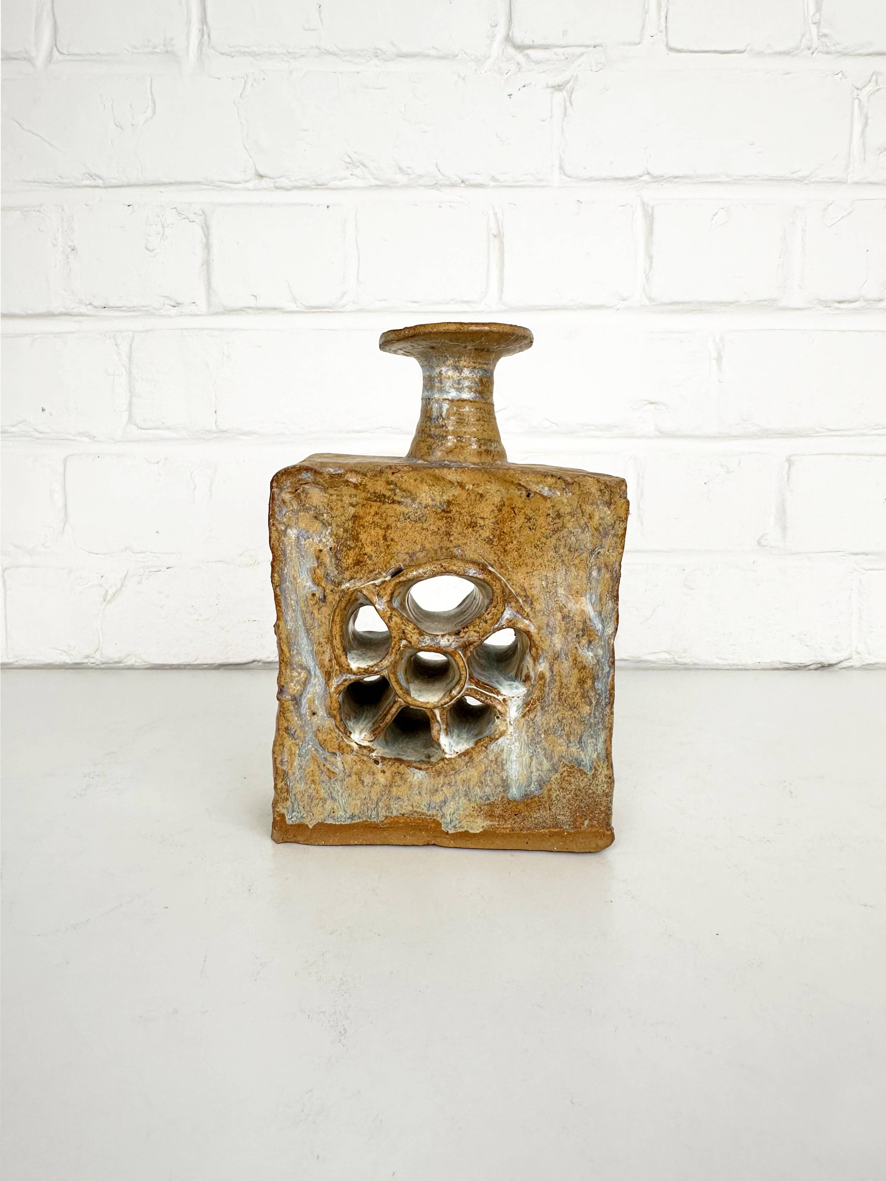 Brutalist stoneware vase with openwork decoration, Denmark, 1970.