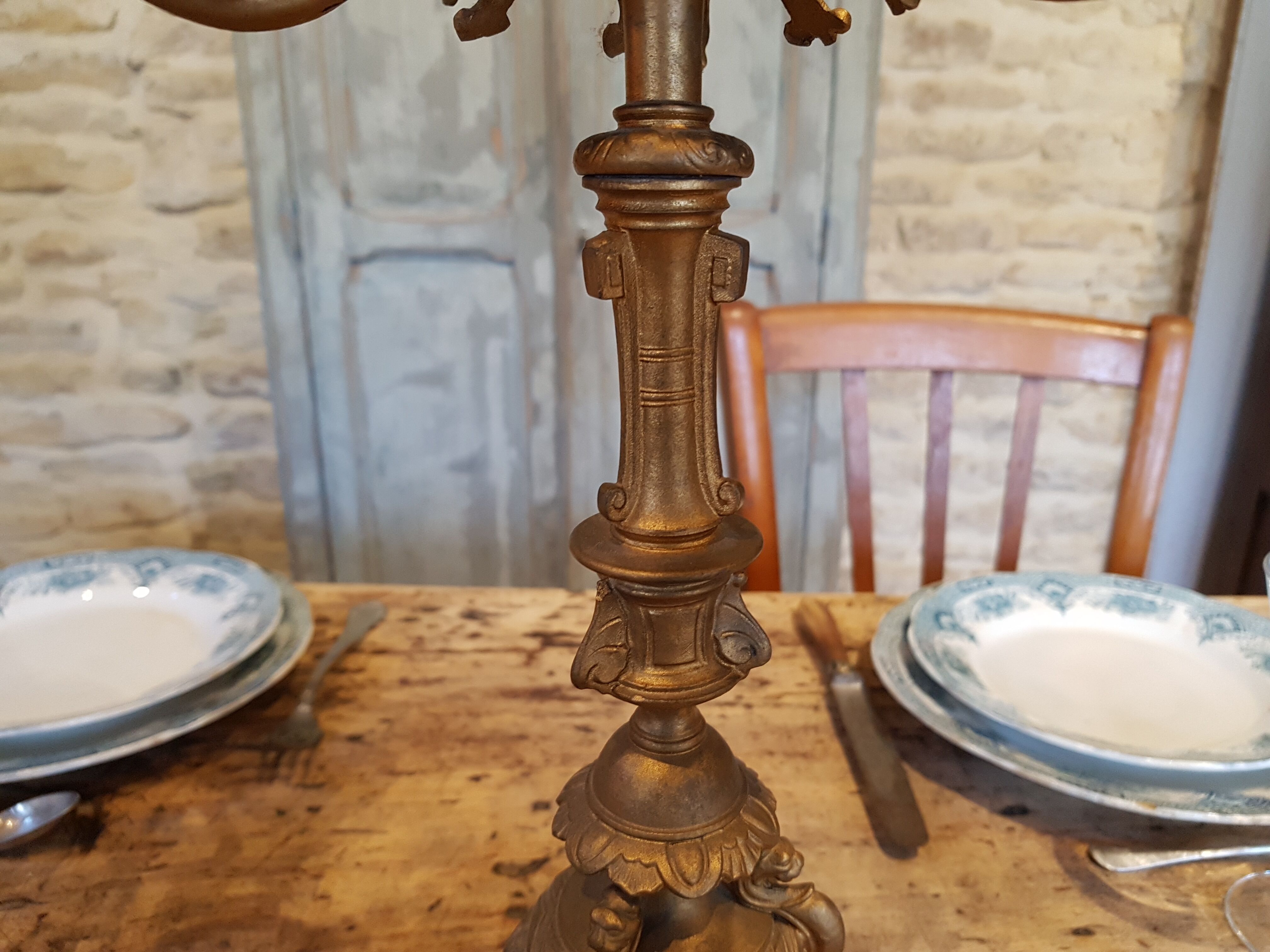Old and majestic chandelier in bronze