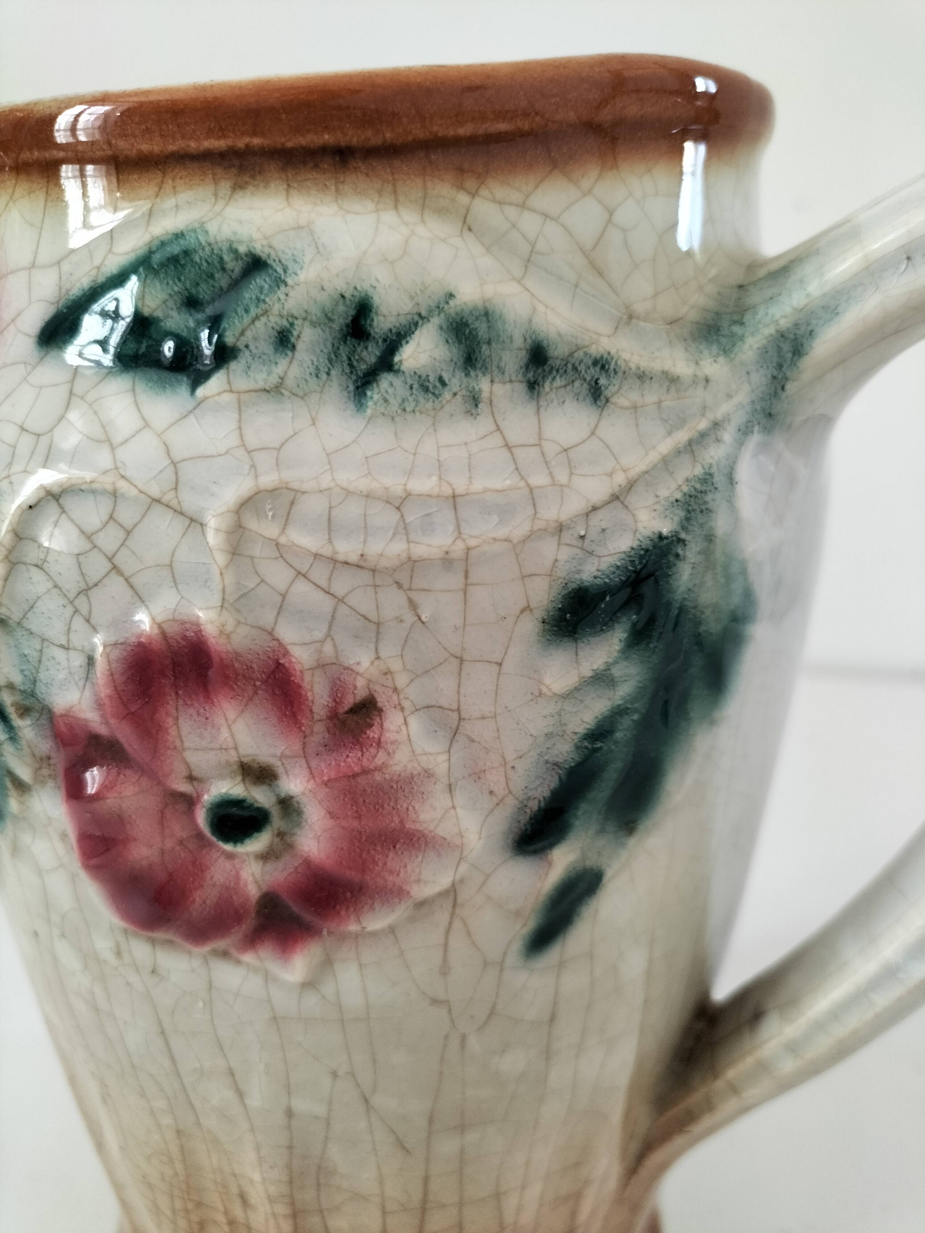 Moulded slip pitcher - late 19th century - Floral decoration in relief