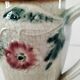 Moulded slip pitcher - late 19th century - Floral decoration in relief