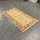 Tapis oriental en laine beige à motif floral