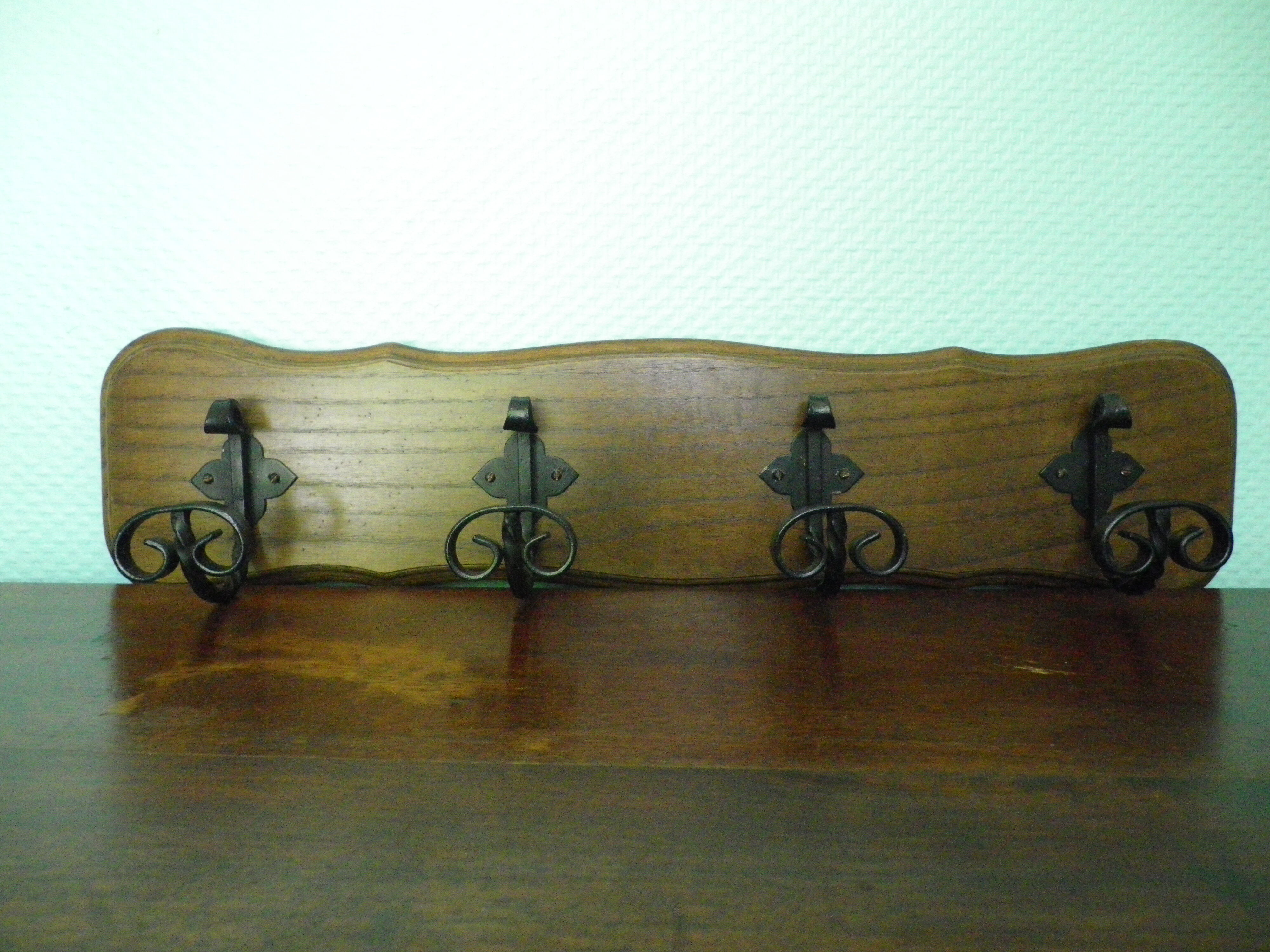 Wooden wall coat rack and its 4 wrought iron hangers, 60s
