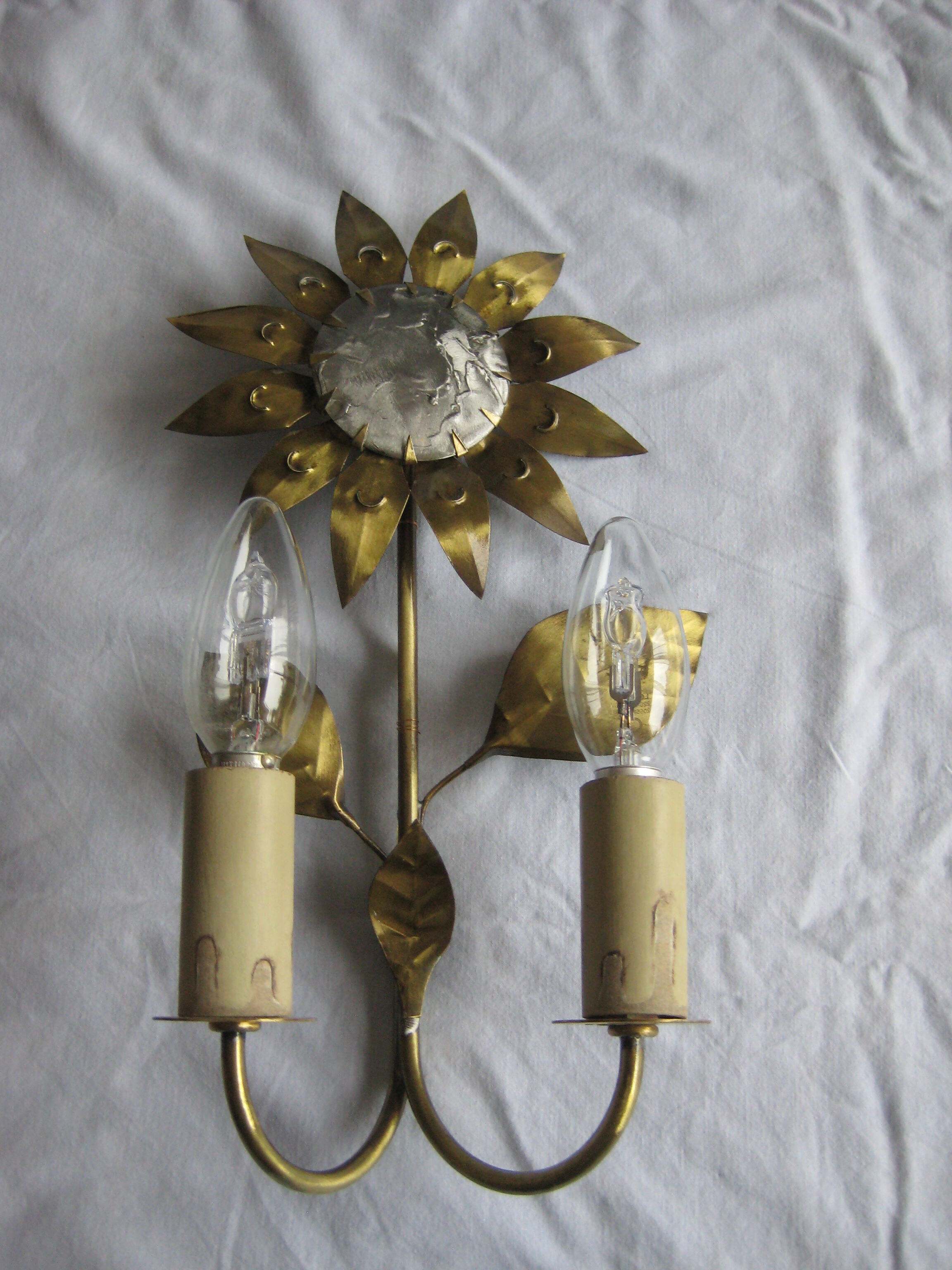 Brass sunflower sconces