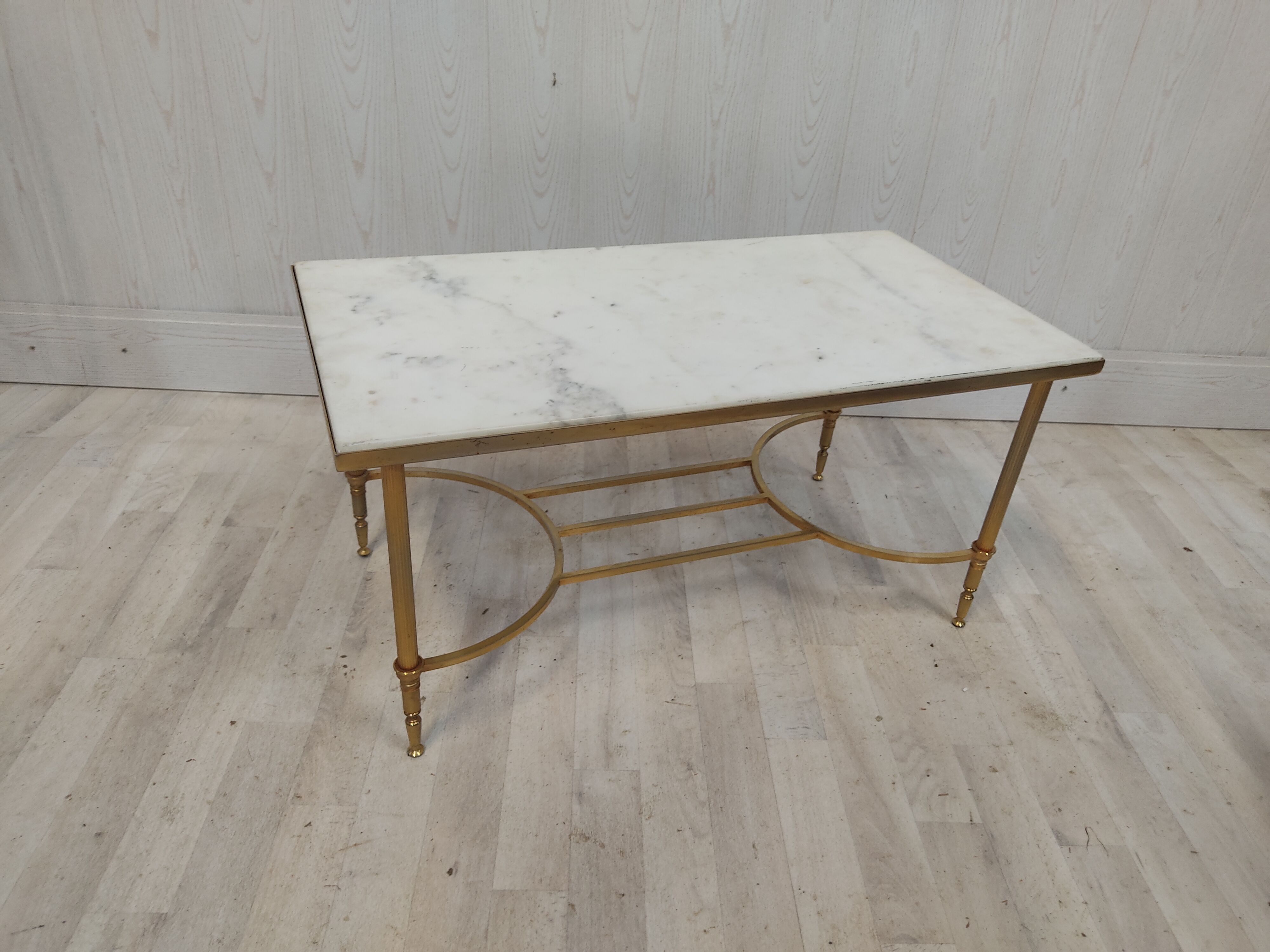 Table basse marbre blanc et métal doré