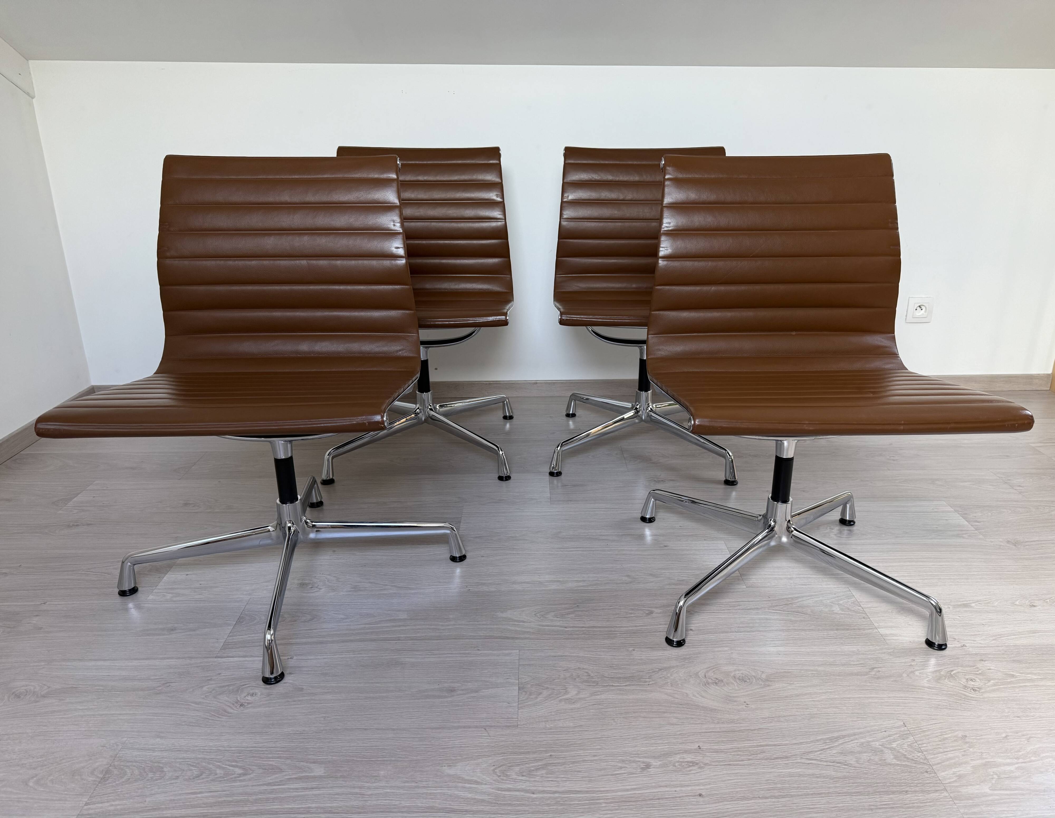 Set of 4 Eames EA105 Vitra armchairs from 2007