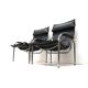2x Vintage black leather armchair by Strässle HE1106 designed by Hans Eichenberger