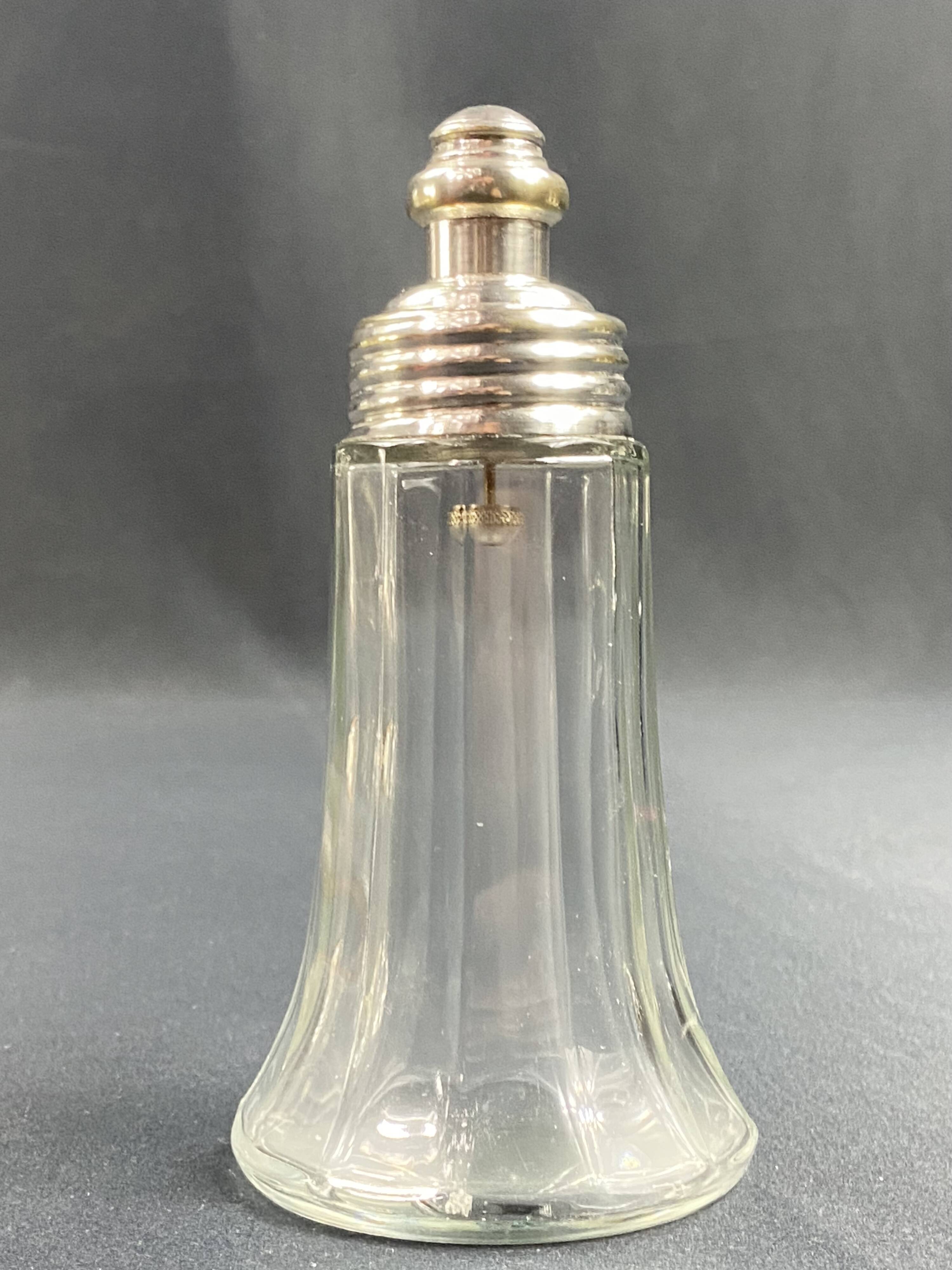 Glass and silver metal sugar shaker