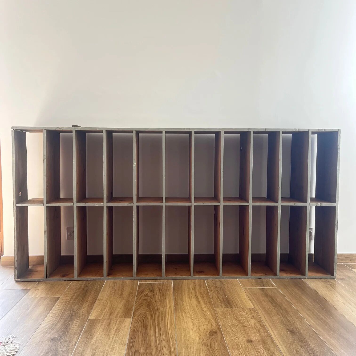 Large antique workshop cabinet with patinated wooden compartments, 20th century.