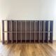 Large antique workshop cabinet with patinated wooden compartments, 20th century.