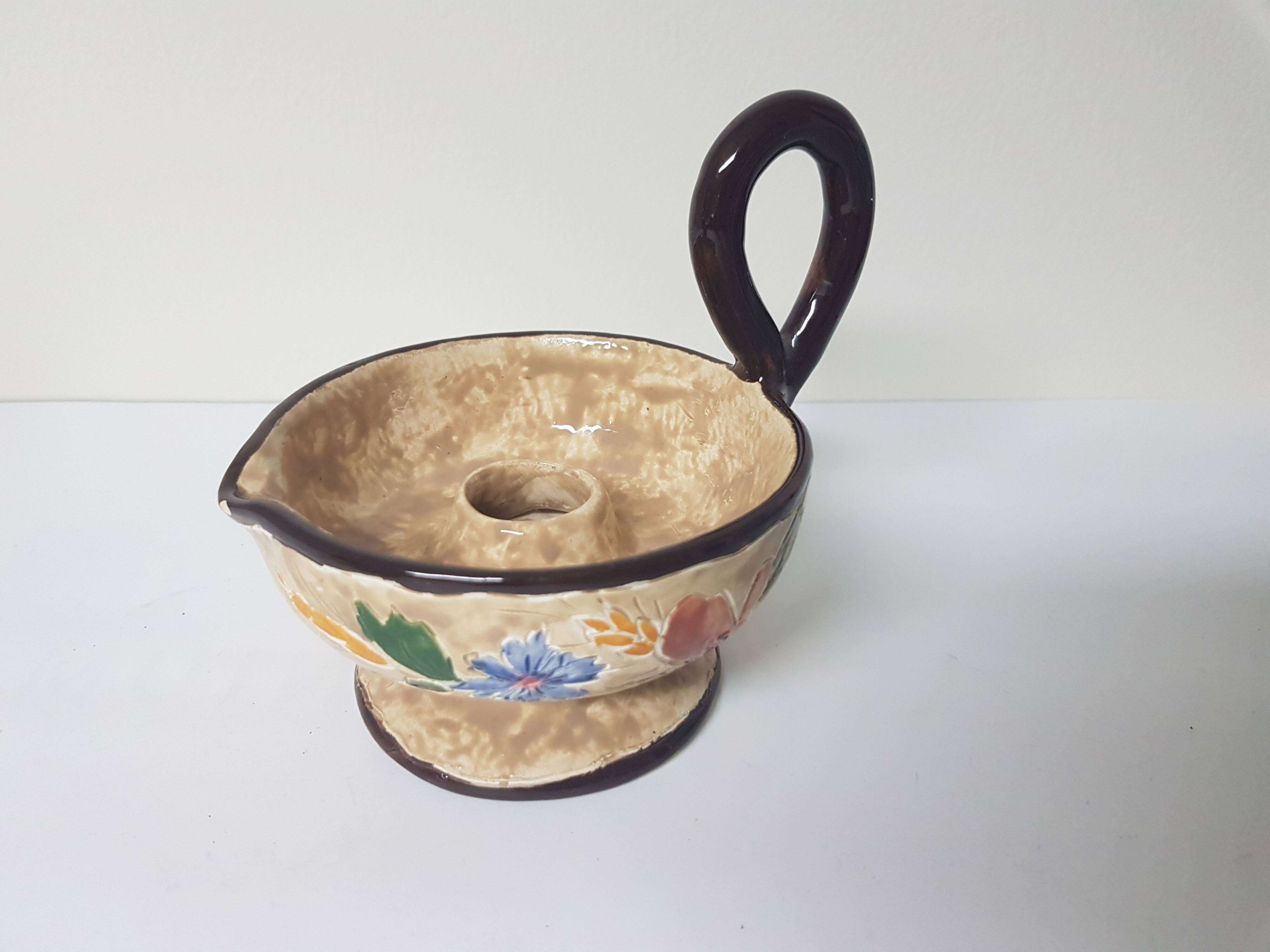 Floral motif ceramic candle holder signed J Massier Vallauris