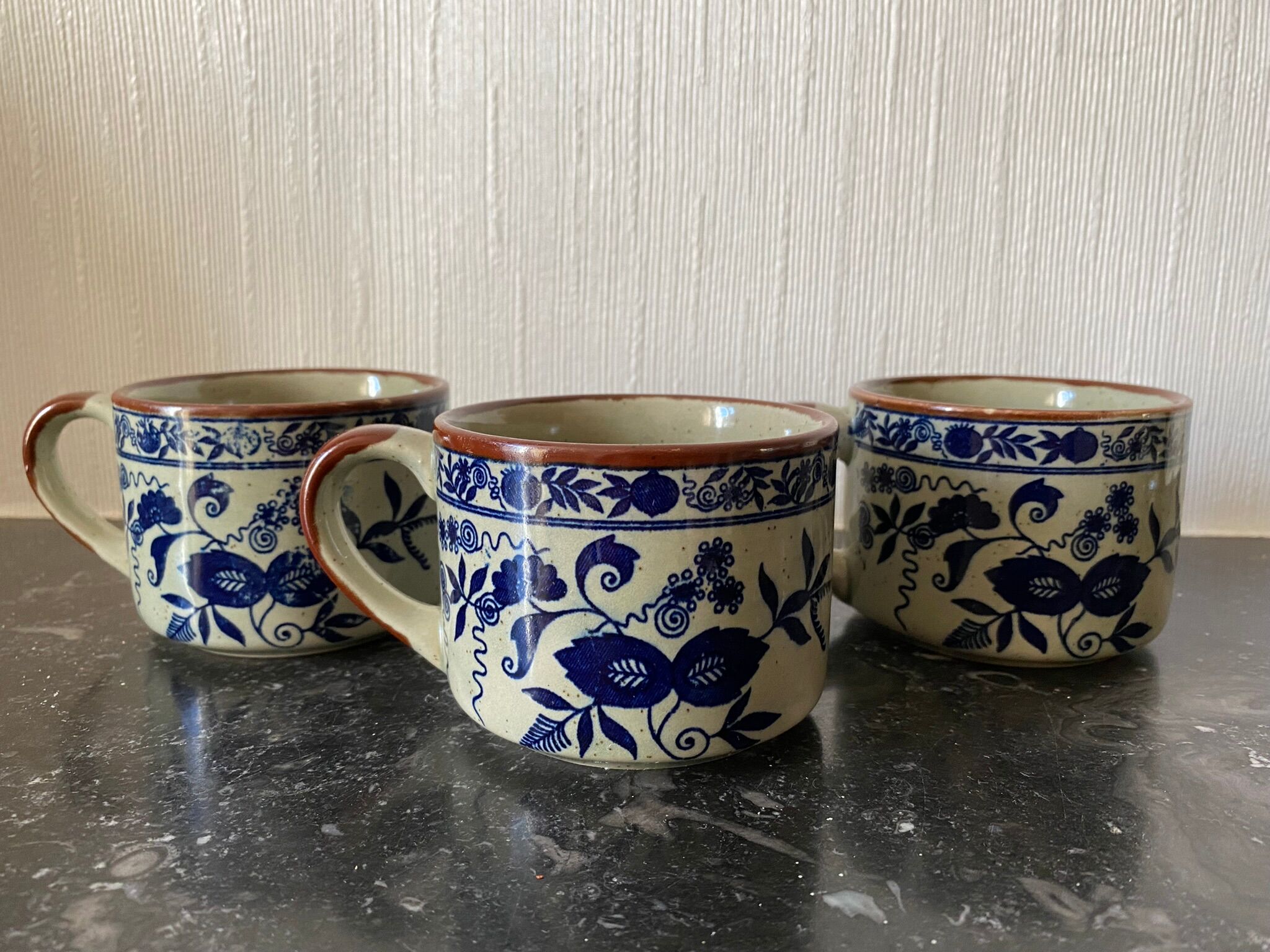 Trio of ceramic coffee cups