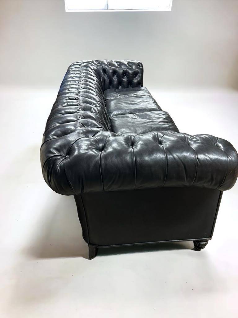 Large and old four-seater leather chesterfield sofa early 20th century l 260 cm