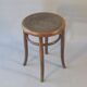 Low stool with wooden seat, circa 1930