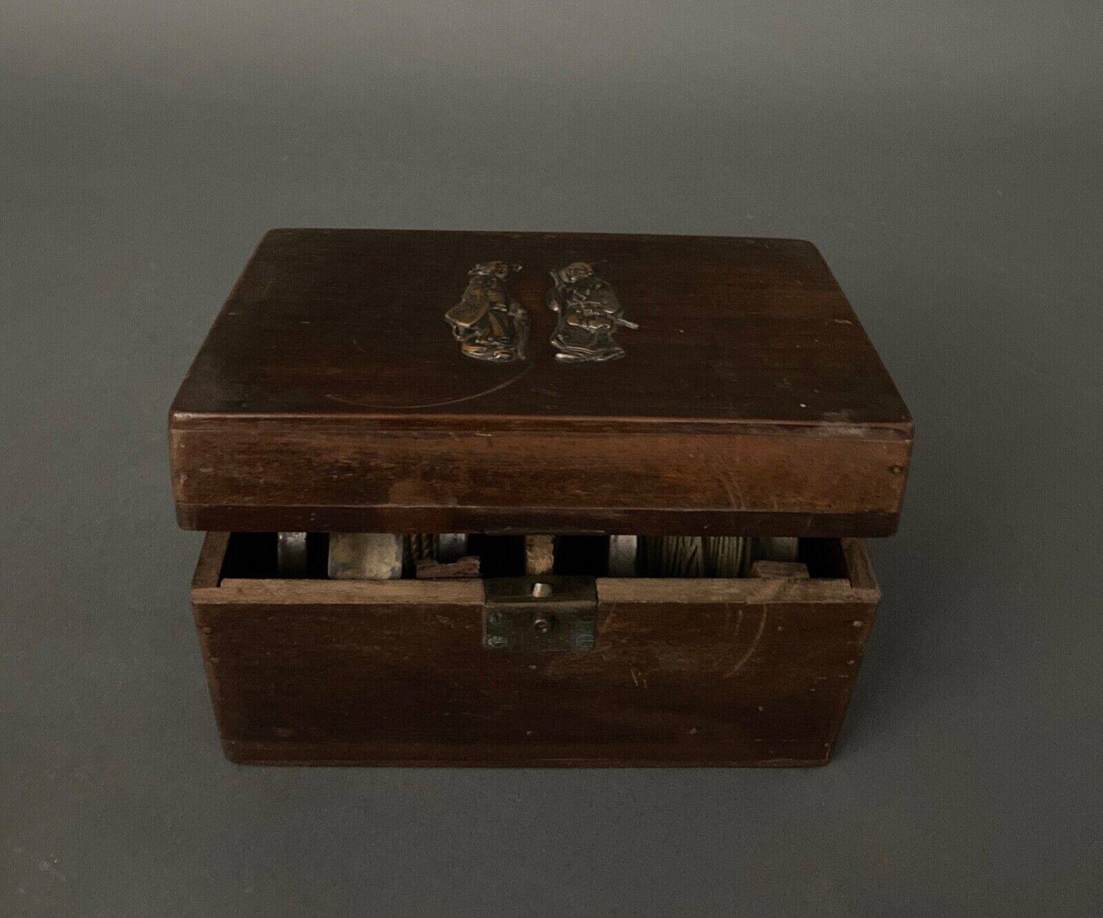 Two reel spools in their original 1900 box