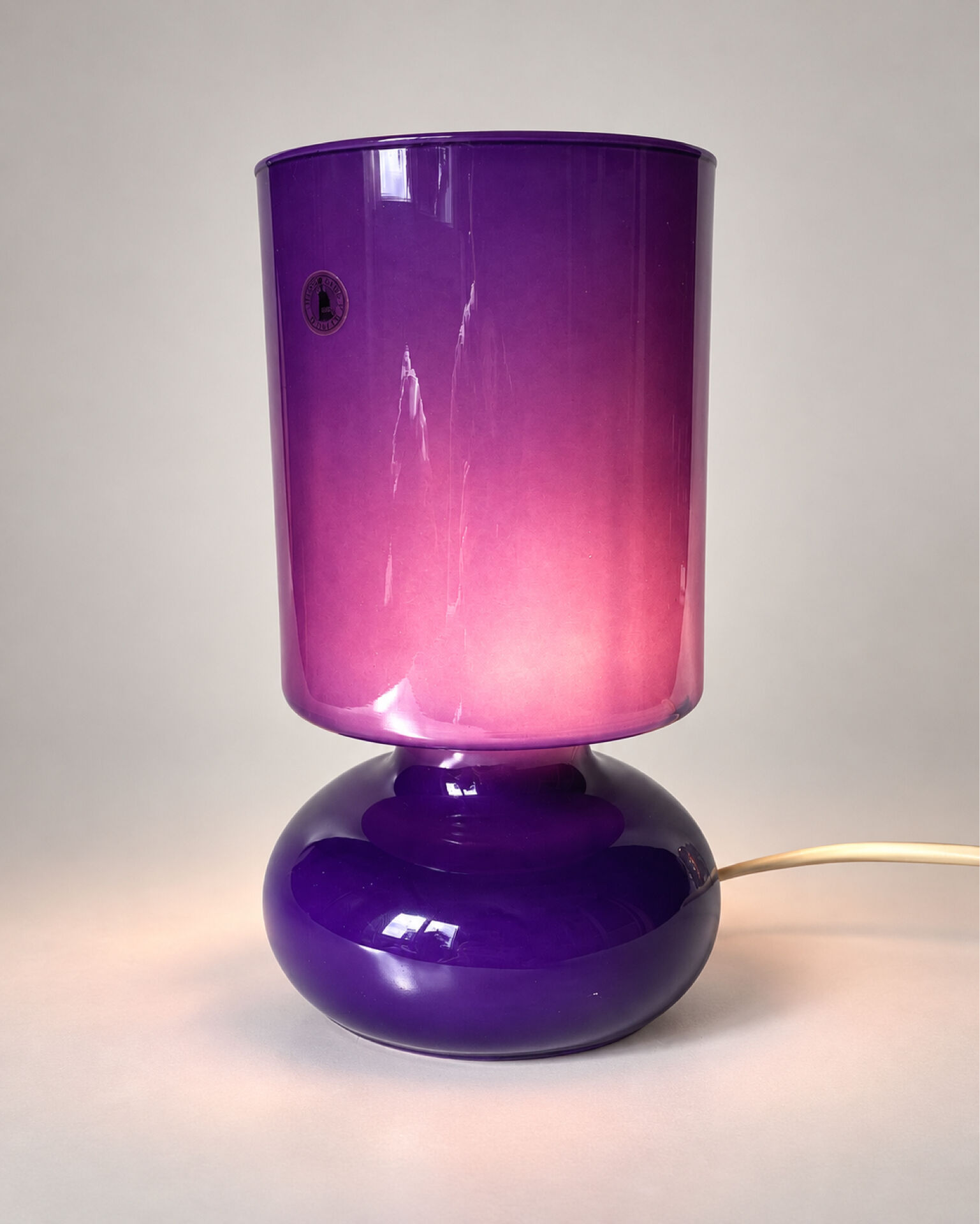 Vintage IKEA lamp, a purple glass lantern.