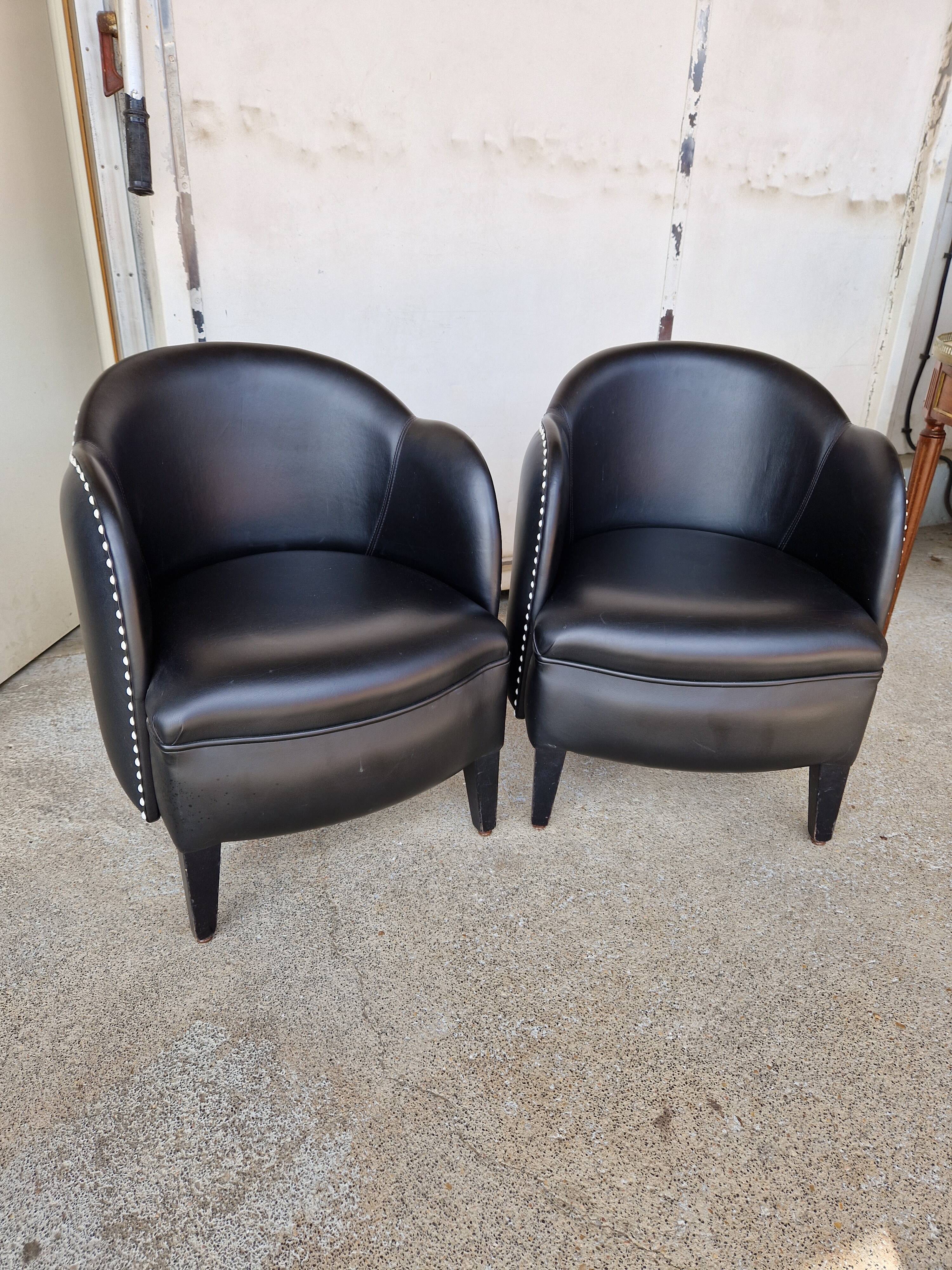 Pair of armchairs in imitation leather