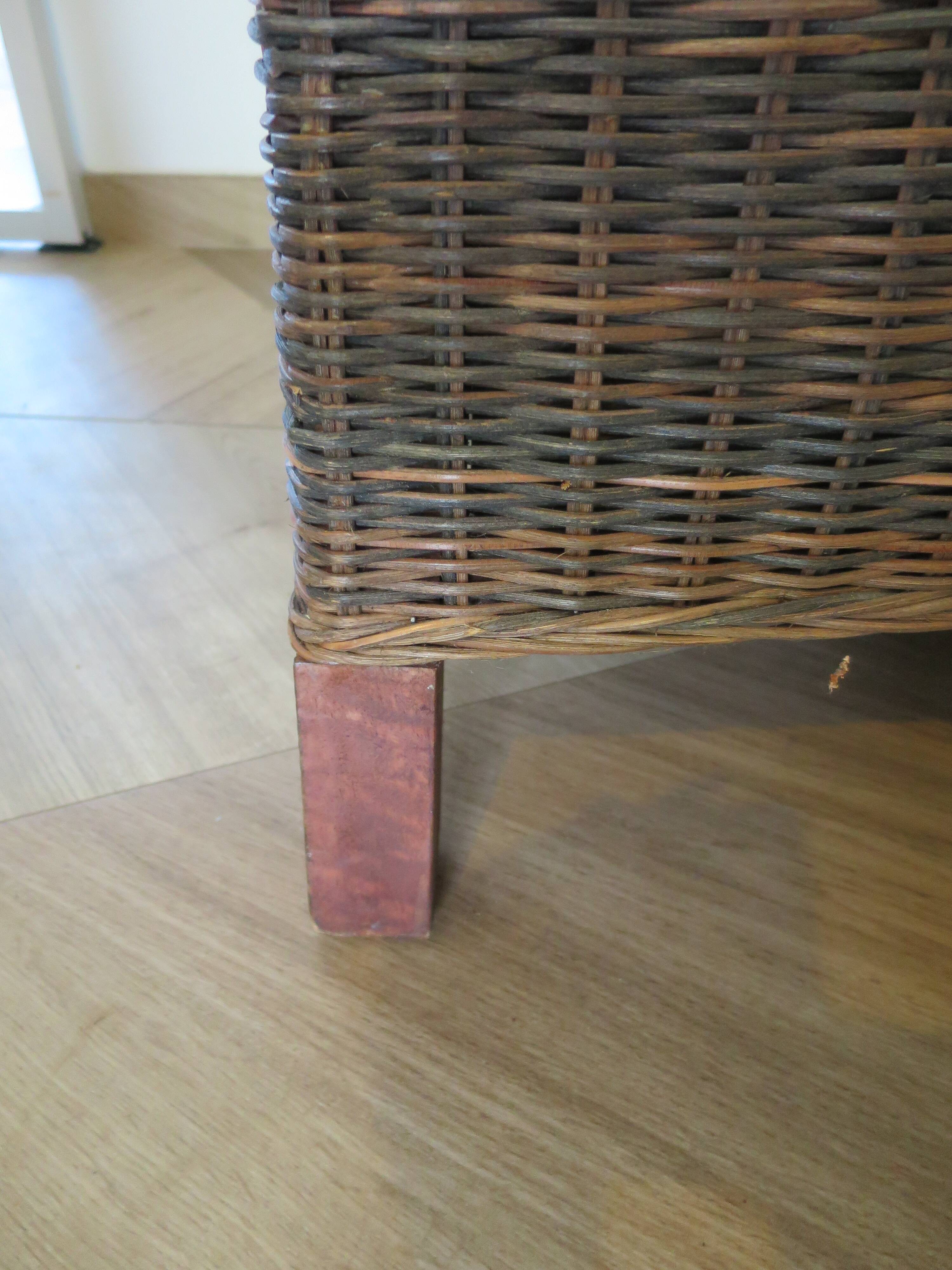 2 colonial-style armchairs in woven rattan and exotic wood