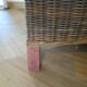 2 colonial-style armchairs in woven rattan and exotic wood