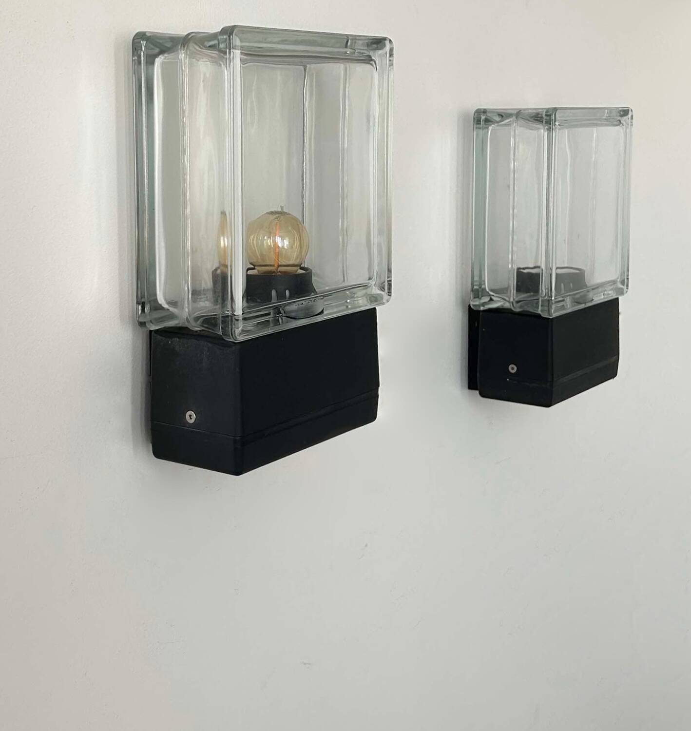 Pair of vintage wall lights, glass and black metal, Italy 1980