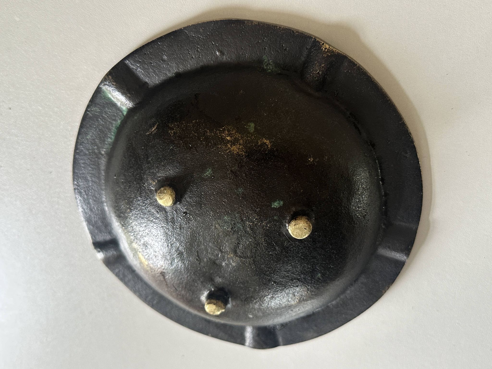 Vintage bronze ashtray design from the 60s