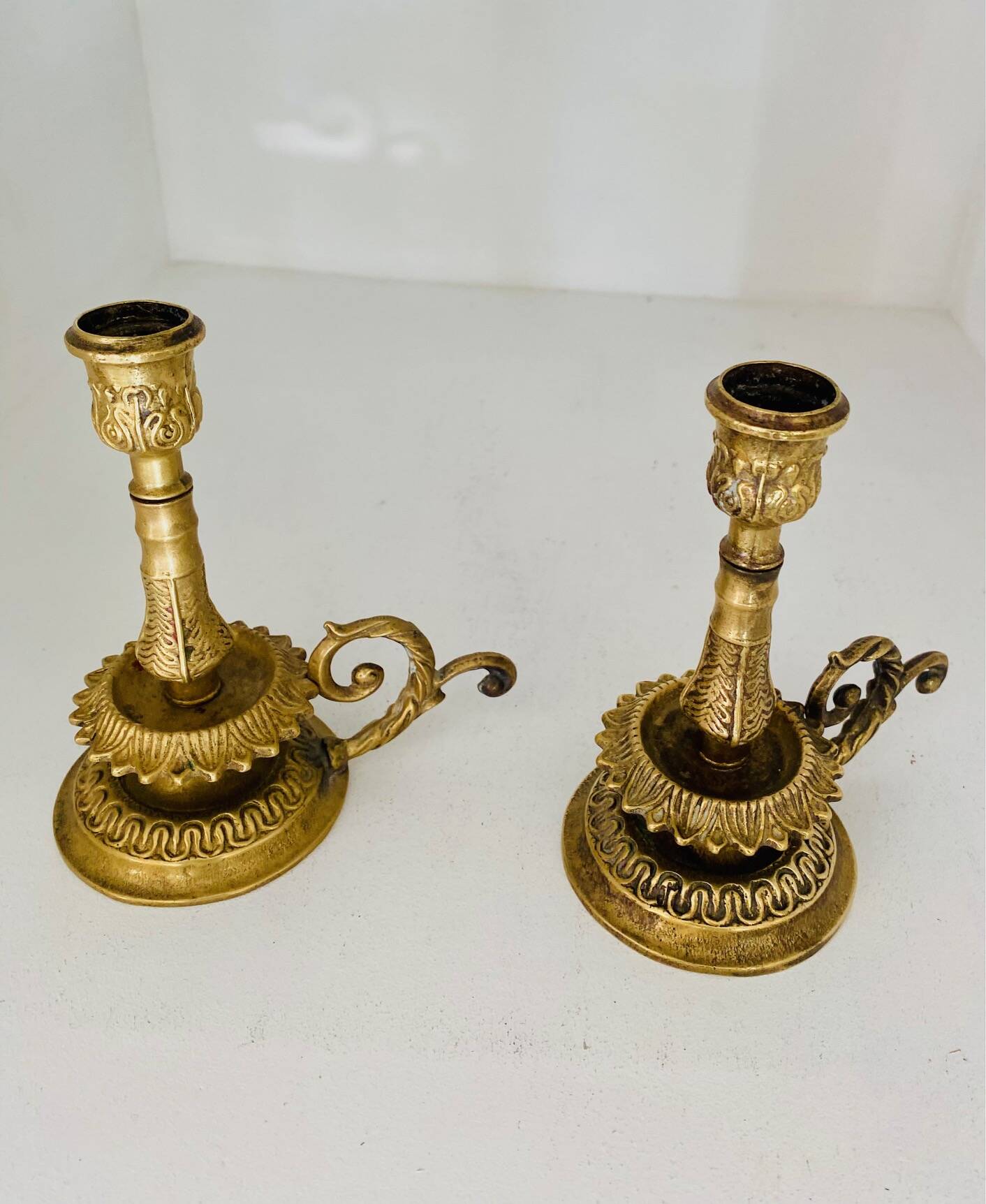 Pair of gilded brass candlesticks