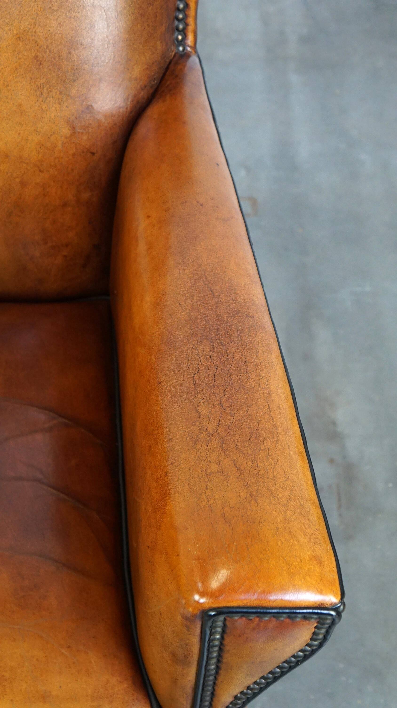 Sleek sheepskin Art Deco design armchair with beautiful details