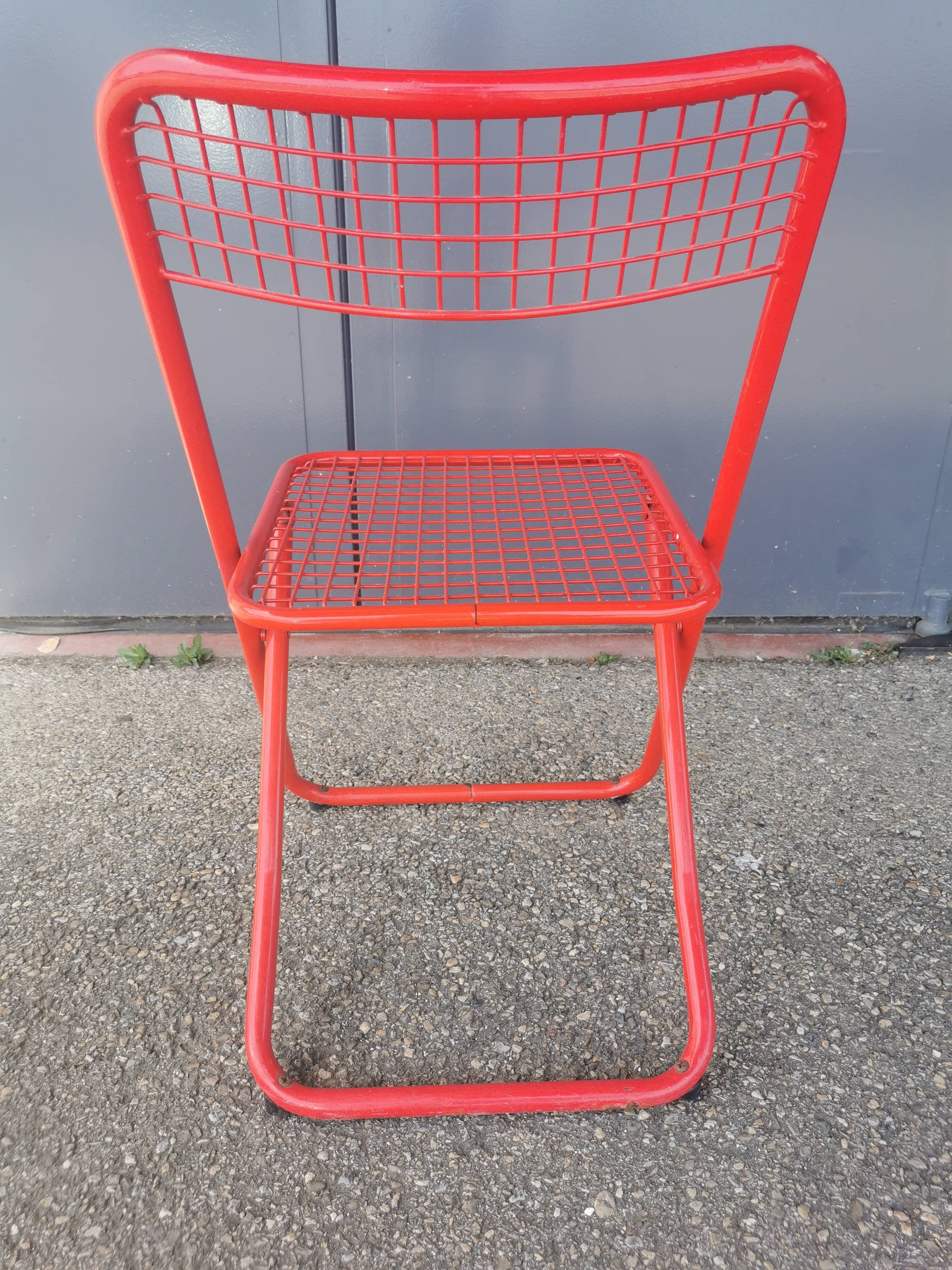 Vintage red metal folding chair