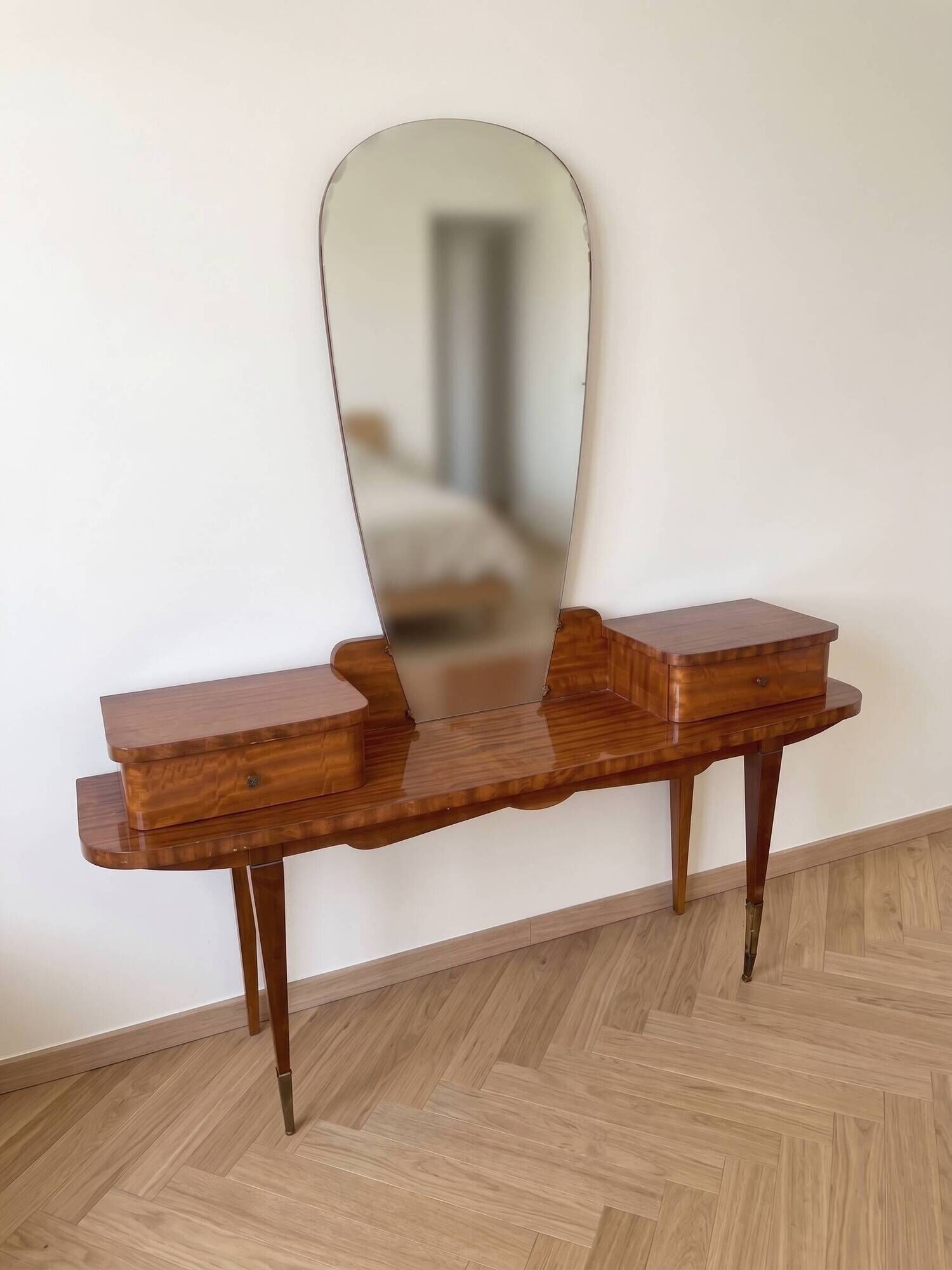 Vintage 1950s wooden vanity with mirror.