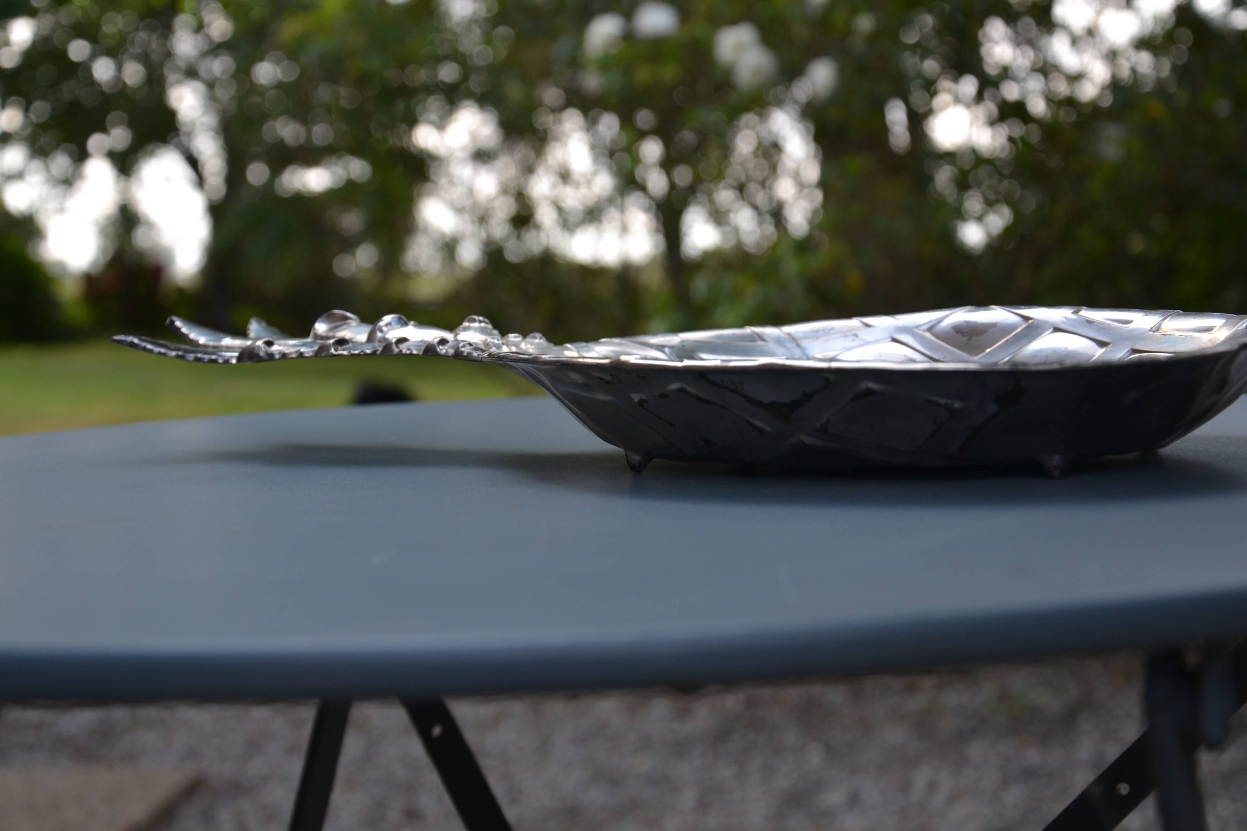 Silver-plated pineapple pocket emptier