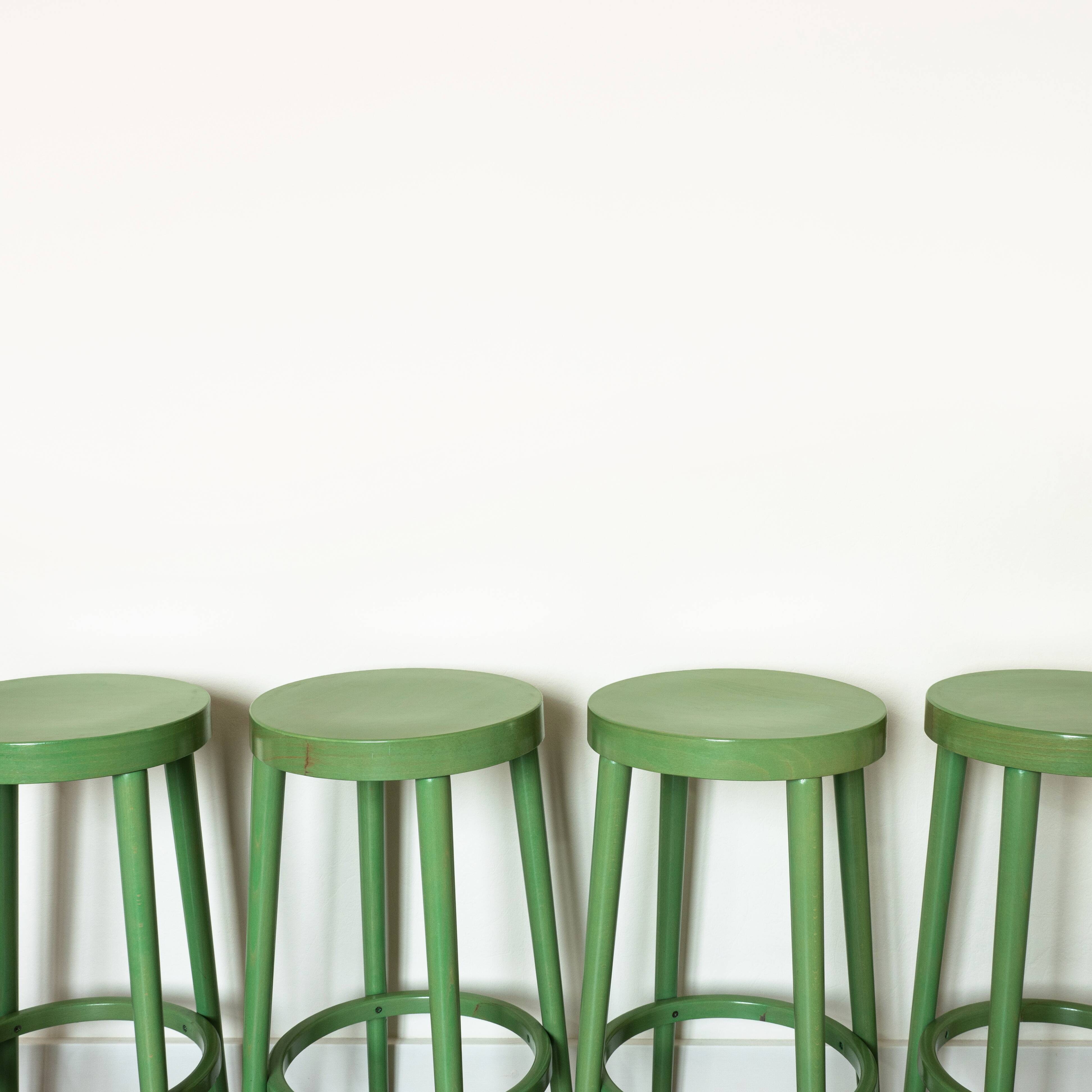 Set of 4 green Baumann stools