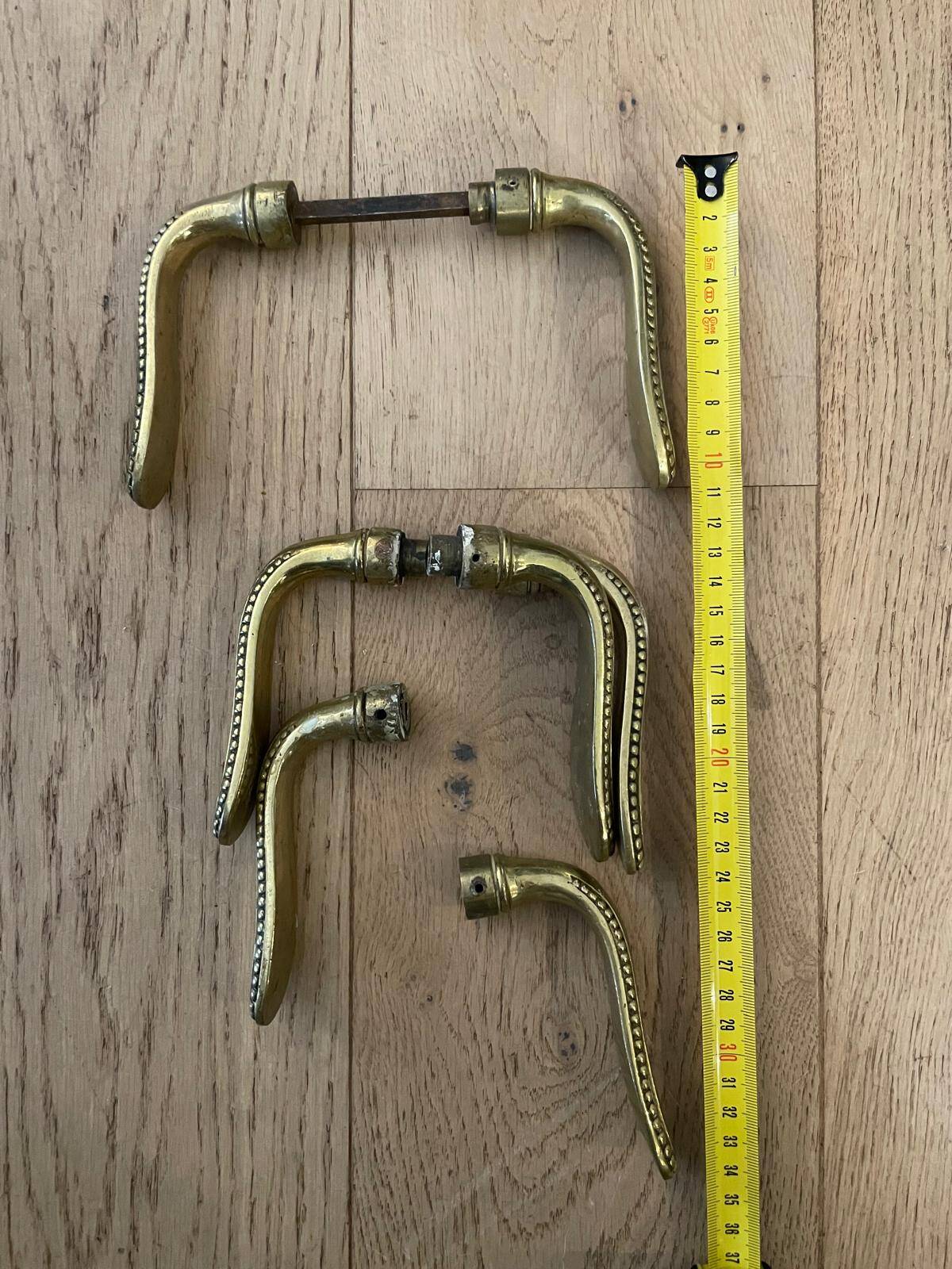 Set of 7 solid brass door handles